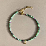 Eirene_bracelets_en__pierre_verte_et_petale_en_argent_or24K
