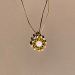 Helios_Mymosaa_bijoux_de_mediterranee_medaillon_talisman_perles_nacre
