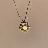 Helios_Mymosaa_bijoux_de_mediterranee_medaillon_talisman_perles_nacre