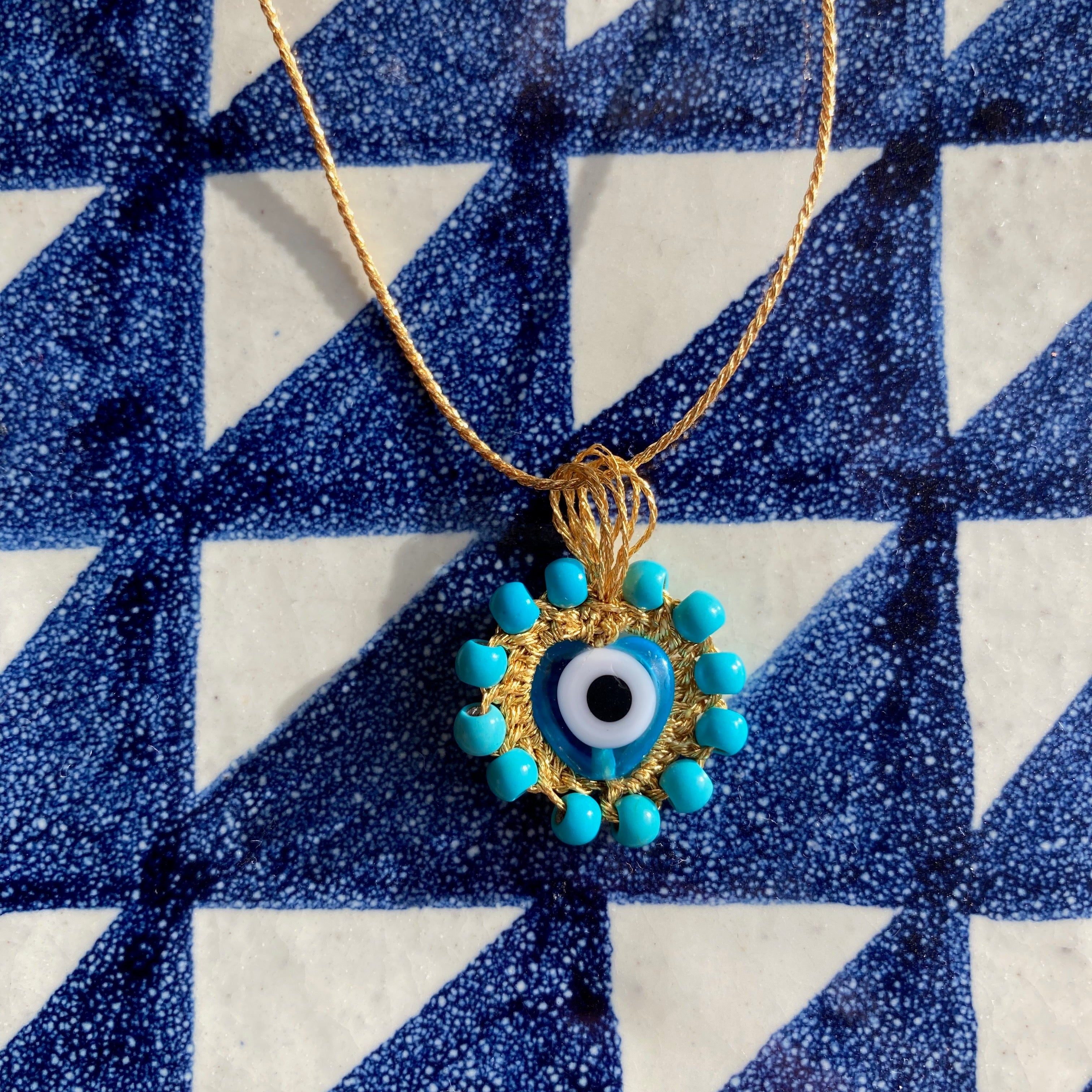 Talisman-oeil-turquoise-bijou-artisanal-de-la Mediterranee