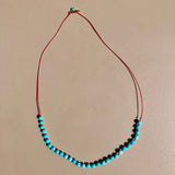Tinos-Mymosaa_bijoux_de_Mediterranee_collier_turquoise_cordon_rouge_argent_or