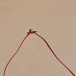 Tinos-Mymosaa_bijoux_de_Mediterranee_collier_turquoise_cordon_rouge_argent_or_detail